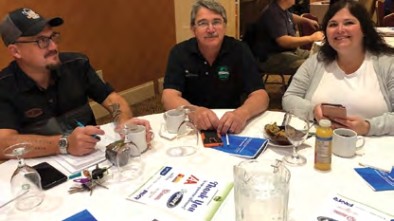 ARAAC Conference sitting at a table