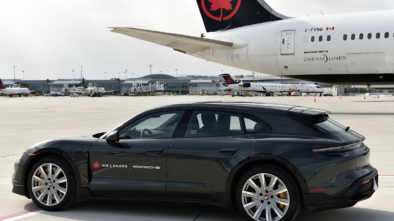porsche and aircanada plane