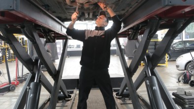 Man working under car