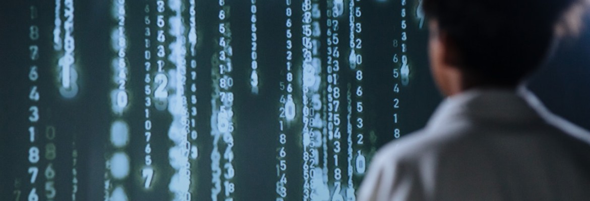 Woman starring into code