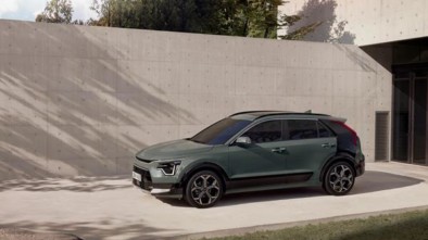 Kia Niro parked by a wall